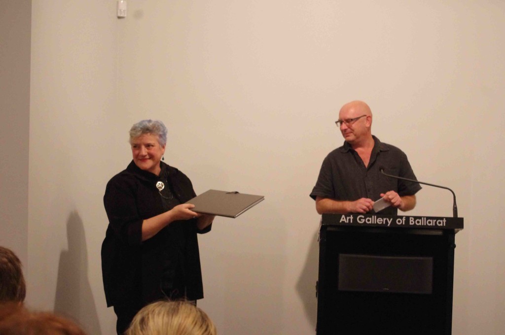 Mark Graver presents the folio to the Art Gallery of Ballarat